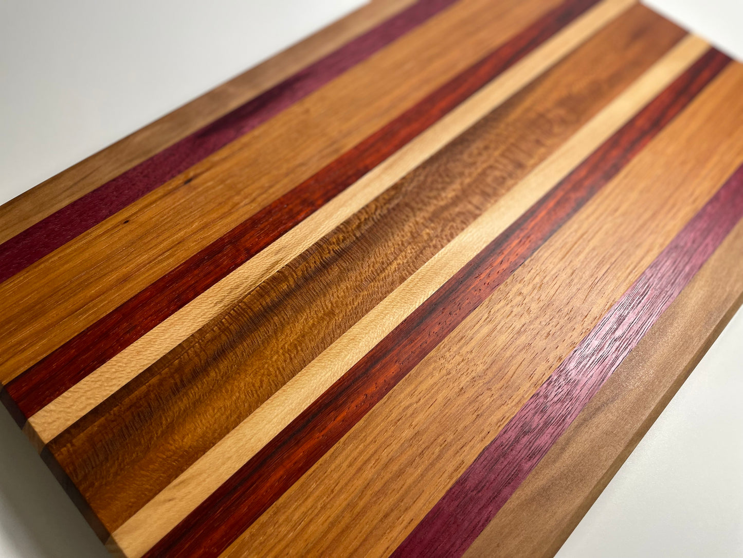 24M006 - Mixed Sycamore, Purpleheart, Hickory & Padauk Board with Champered Edge