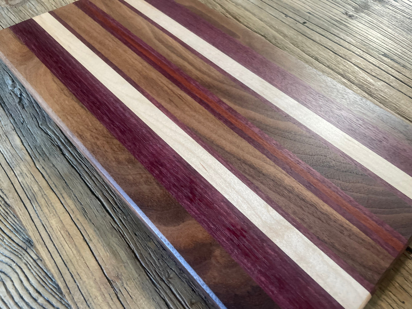 25M010 - Mixed Black Walnut, Padauk, Maple & Purpleheart Board