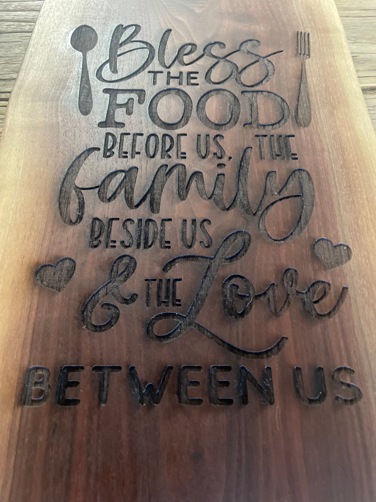 25L021 - Dual Live Edge “Bless The Food” Engraved Walnut Board