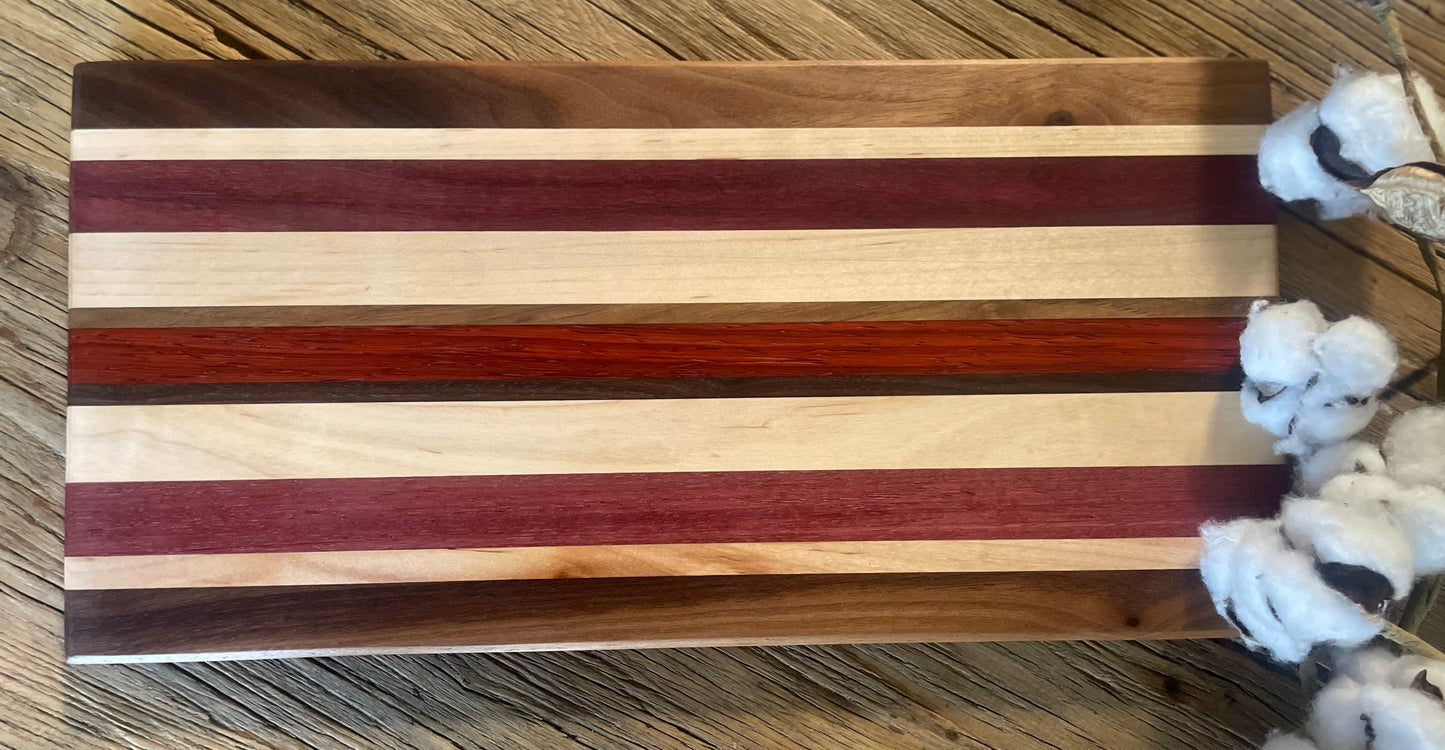 25M011 - Mixed Black Walnut, Padauk, Maple & Purpleheart Board