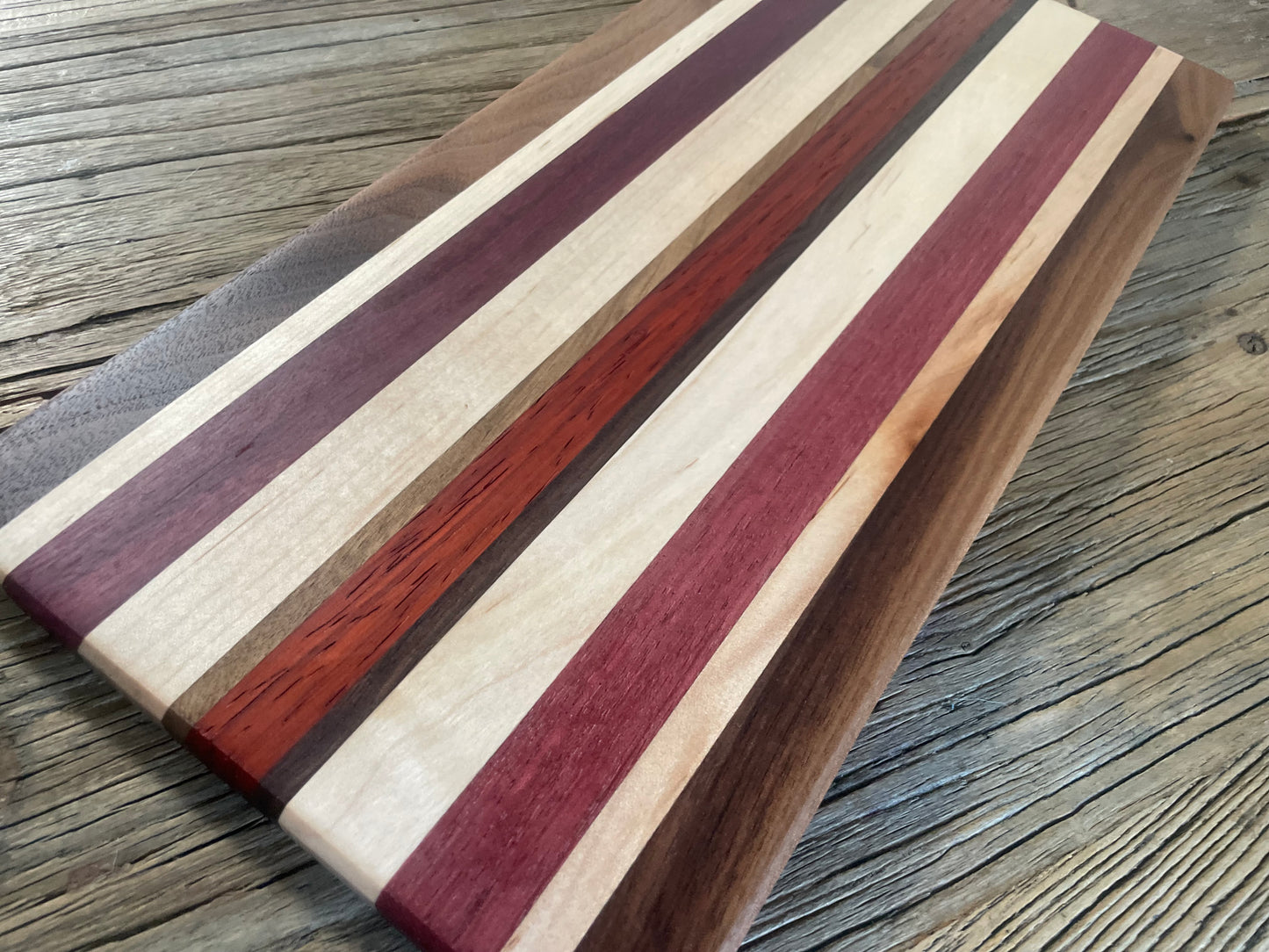 25M011 - Mixed Black Walnut, Padauk, Maple & Purpleheart Board