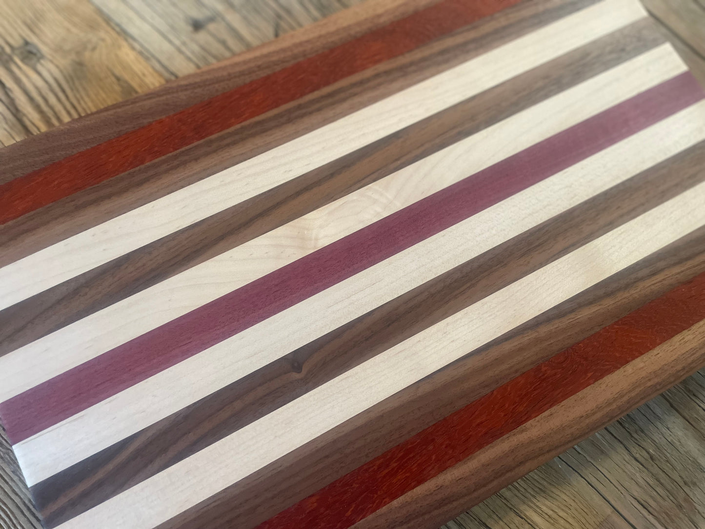 24M022 - Mixed Black Walnut, Padauk, Maple & Purpleheart Board
