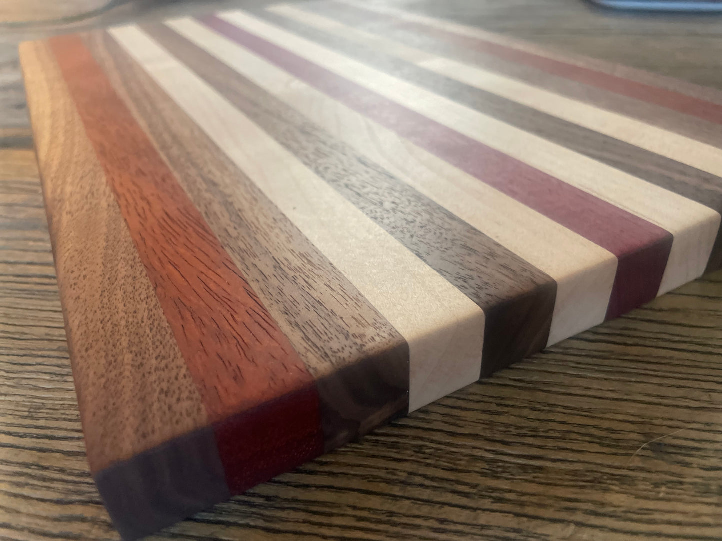 24M022 - Mixed Black Walnut, Padauk, Maple & Purpleheart Board