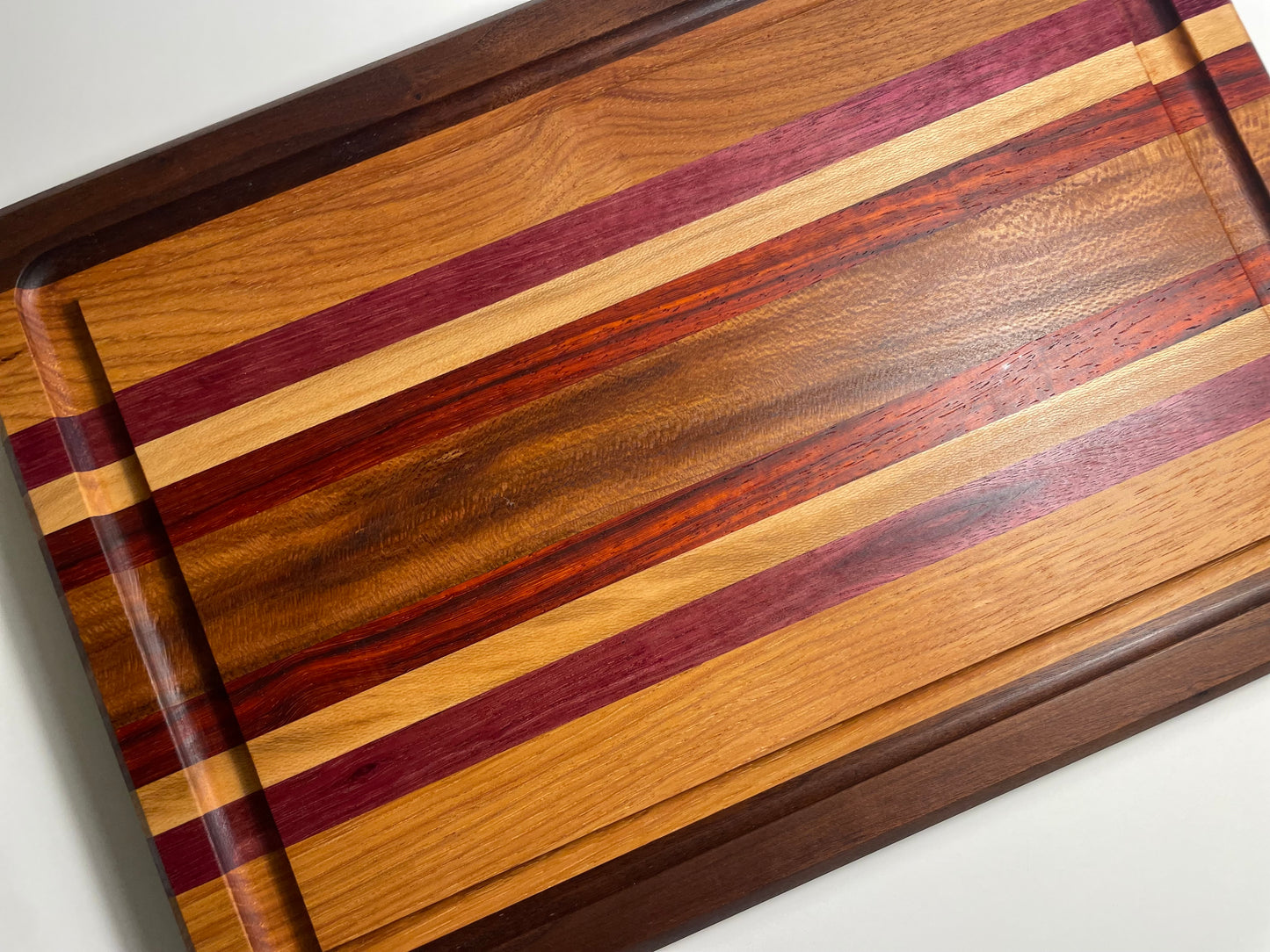 24M007 - Mixed Black Walnut, Hickory, Purpleheart, Sycamore & Padauk Board with Champered Edge & Juice Groove