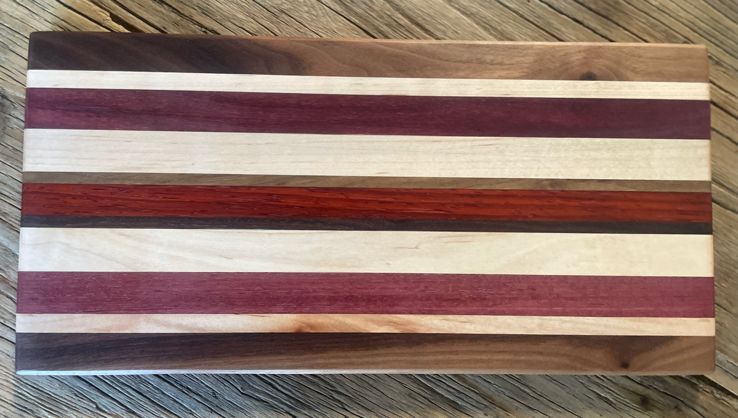 25M011 - Mixed Black Walnut, Padauk, Maple & Purpleheart Board