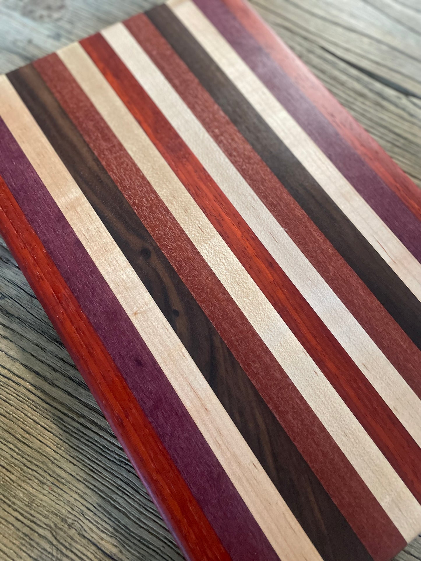 24M024 - Mixed Padauk, Purpleheart, Maple, Santo Mahogany & Black Walnut Board