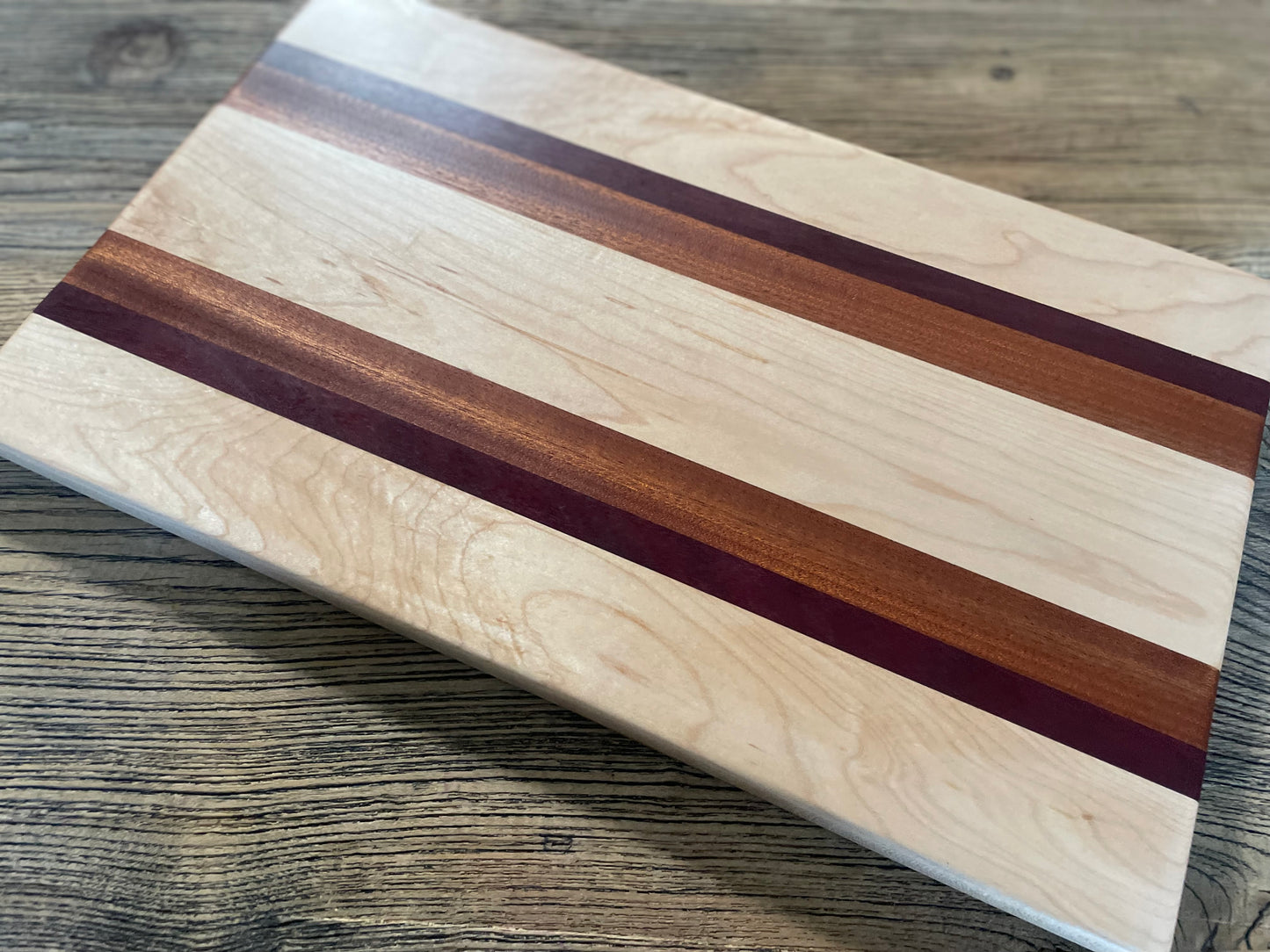 25M024 - Mixed Maple, Purpleheart & Sapele Board