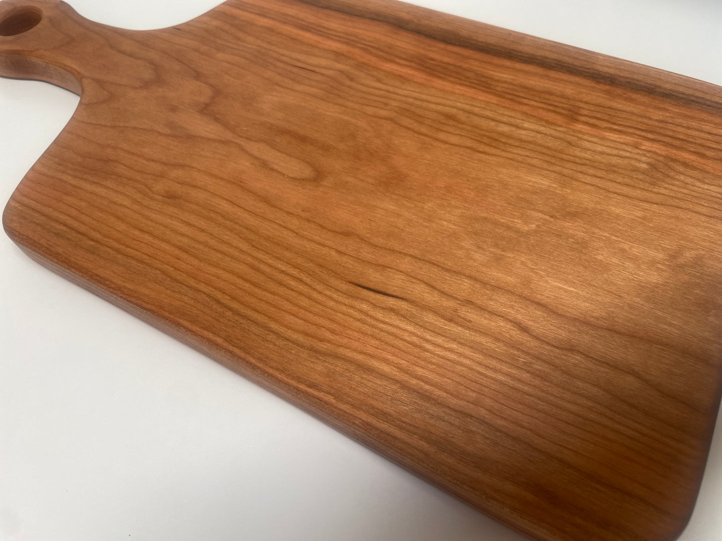 24H002 - Large Solid Cherry Engraved Handle Board