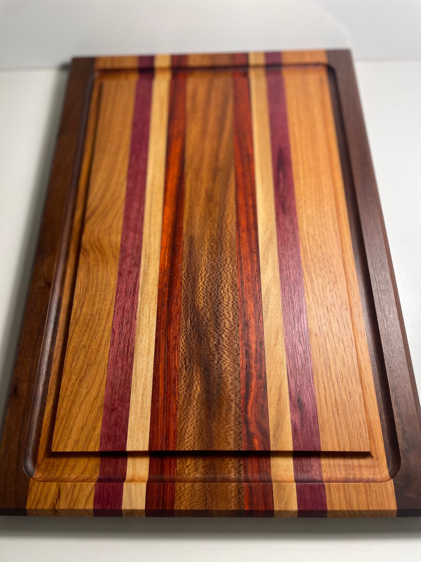 24M007 - Mixed Black Walnut, Hickory, Purpleheart, Sycamore & Padauk Board with Champered Edge & Juice Groove